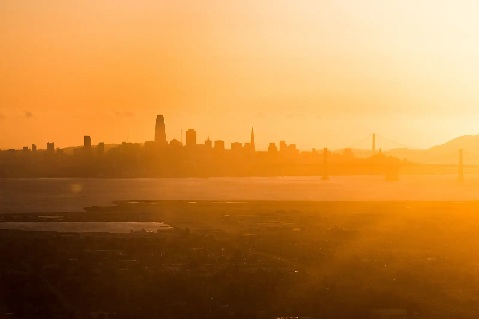 A skyline dissolving into a golden haze