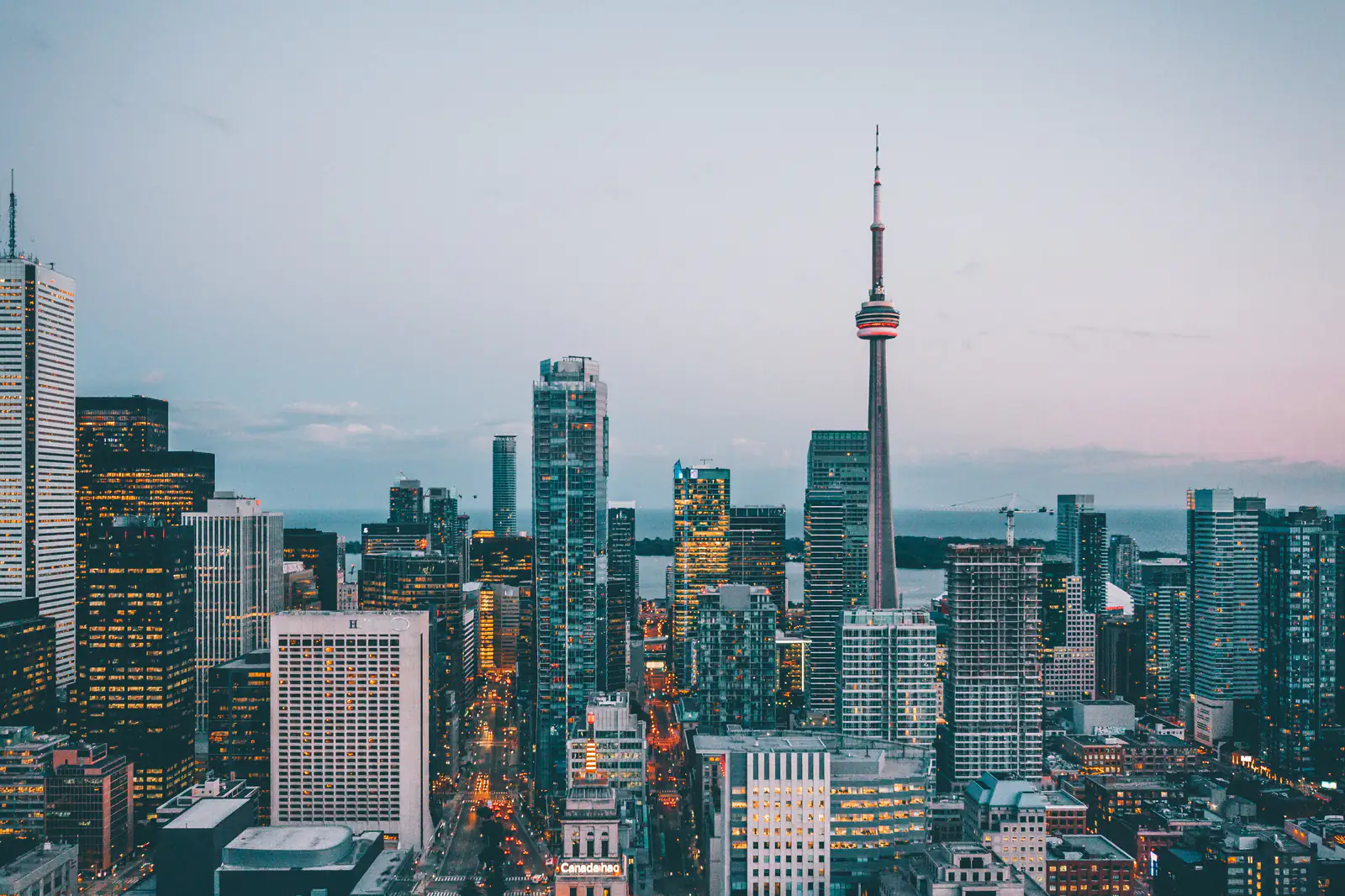 A downtown skyline in soft evening light