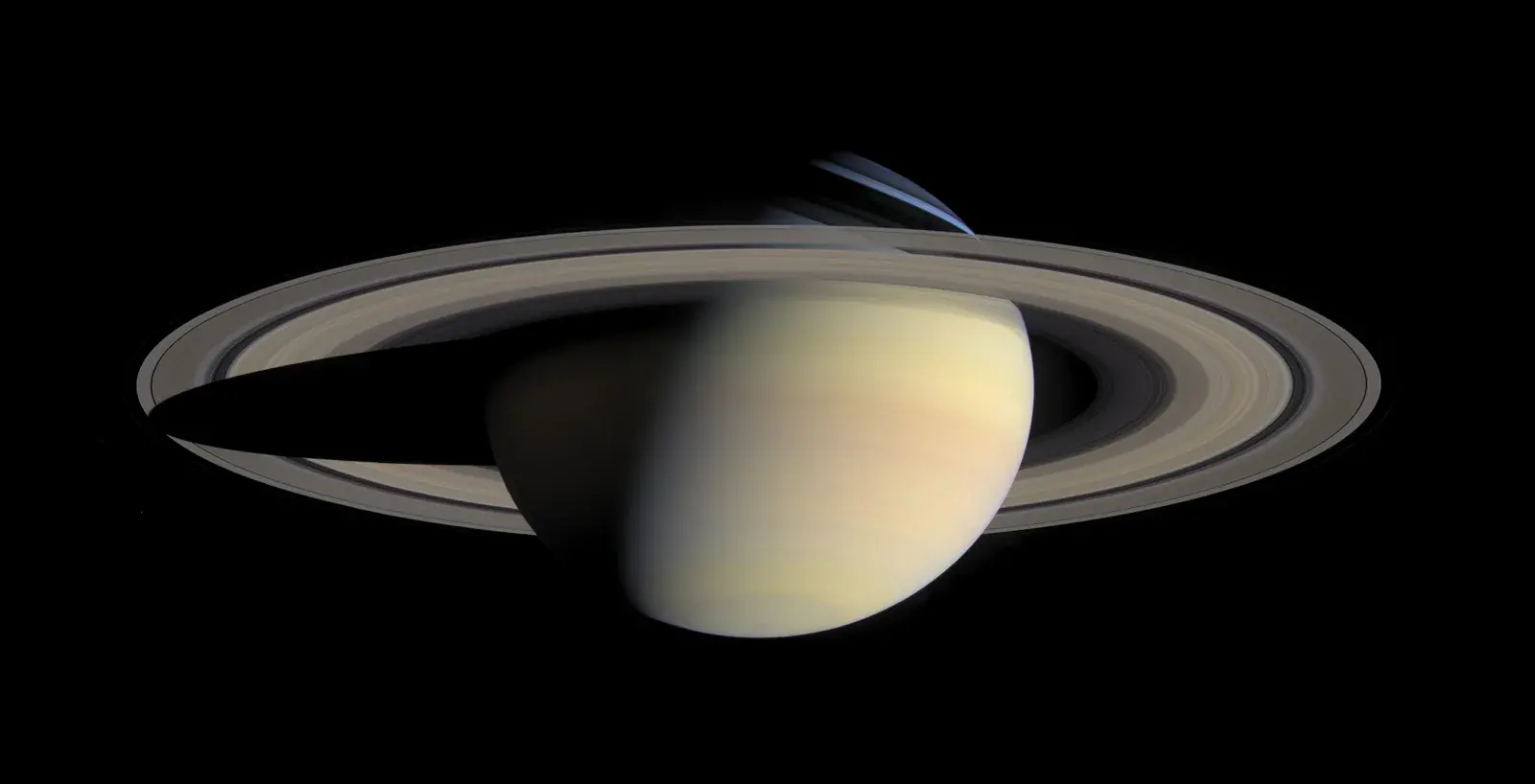 Cassini natural-colour mosaic of Saturn with its full ring system and the rings' shadow on the planet