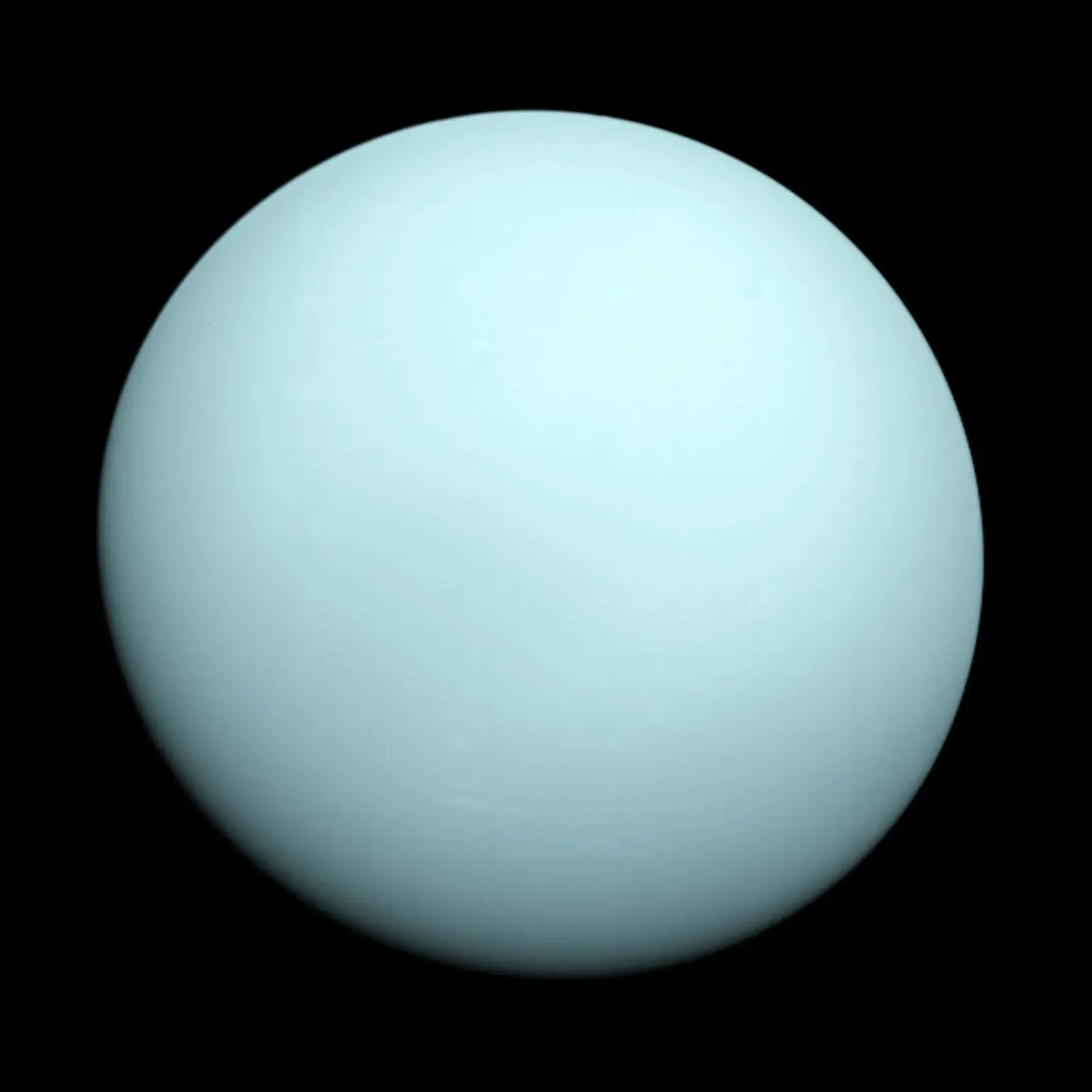 Voyager 2 photograph of Uranus, a smooth pale blue-green globe