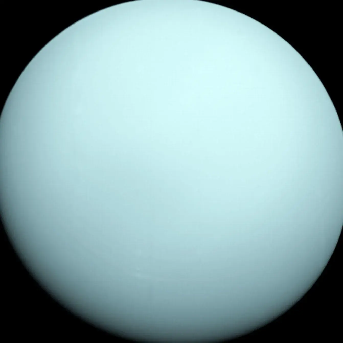 Uranus, a smooth pale cyan globe, photographed by Voyager 2
