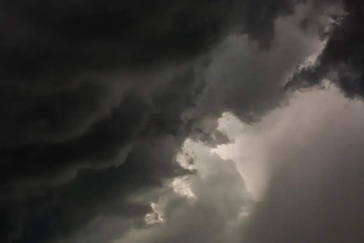 Dark, churning storm clouds fill the sky (Scorpio and Aquarius compatibility)