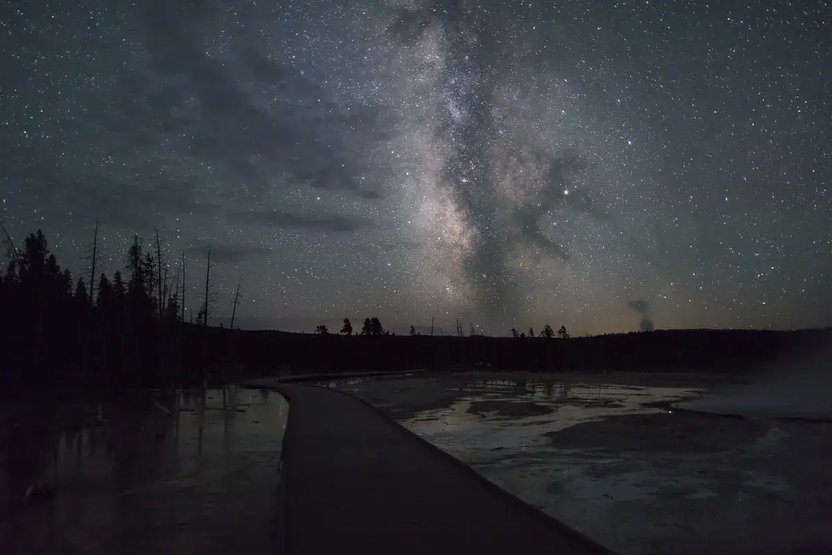 The Milky Way over the steaming thermal basin at Fountain Paint Pots